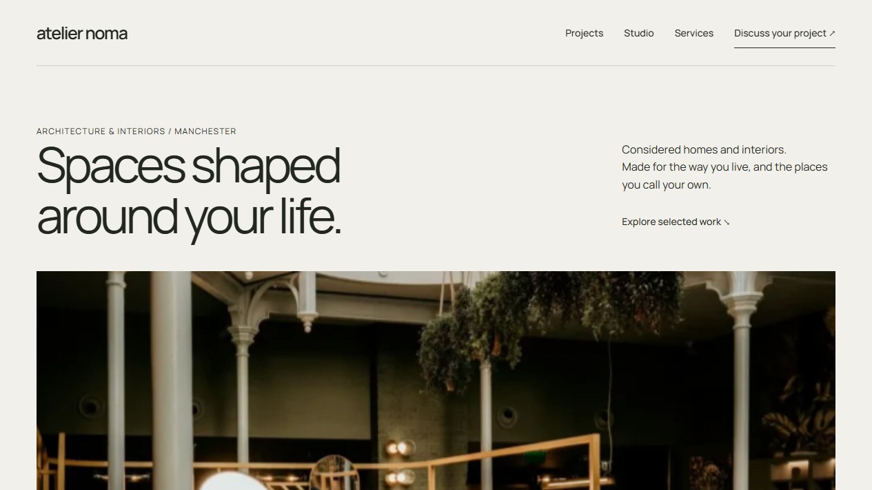 Atelier NOMA concept homepage showing its headline, navigation, and primary image
